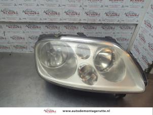 O191136 Gebruikte rechter koplamp Volkswagen Touran