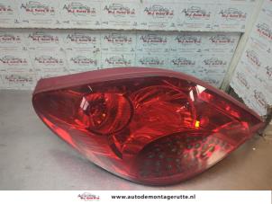 O191247 Gebruikte achterlicht links Peugeot 207