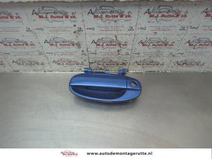 O191365 Gebruikte portiergreep 4deurs links-voor Chevrolet Aveo