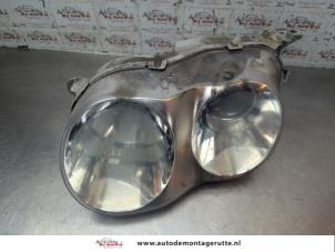 O191437 Gebruikte linker koplamp Hyundai Coupe