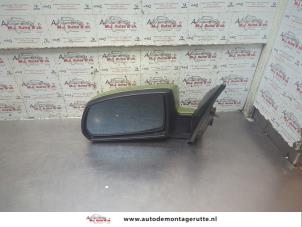 O191583 Gebruikte spiegel buiten links Kia Rio