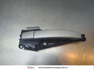 O191758 Gebruikte portiergreep 4deurs rechts-achter Opel Astra