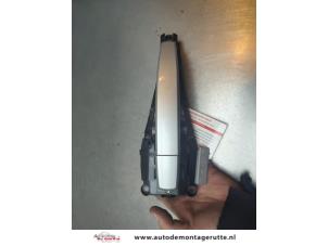 O191756 Gebruikte portiergreep 4deurs links-achter Opel Astra