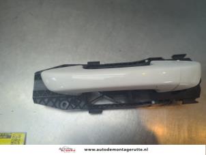 O191803 Gebruikte portiergreep 4deurs links-achter Volkswagen Golf