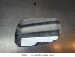 O191869 Gebruikte spiegelglas links Volkswagen Fox