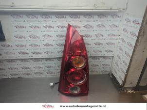O192104 Gebruikte achterlicht links Mazda Premacy
