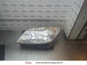 O192236 Gebruikte koplamp links Opel Astra
