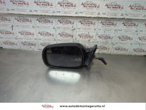 O192417 Gebruikte spiegel buiten links Toyota Starlet