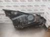 Gebruikte Koplamp links Opel Corsa O192558