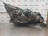 Gebruikte Koplamp links Opel Corsa O192642