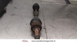 O192832 Gebruikte aandrijfas links-voor Nissan Primera