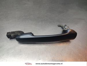 O192859 Gebruikte portiergreep 4deurs links-voor Mazda 5.