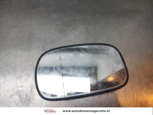 O192890 Gebruikte spiegelglas links Nissan Micra