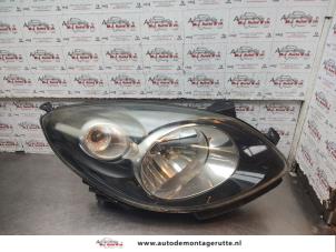 O193039 Gebruikte rechter koplamp Renault Twingo