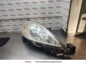 O193382 Gebruikte rechter koplamp Mazda 5.