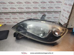 O193398 Gebruikte linker koplamp Mazda 2.