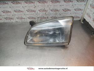 O193411 Gebruikte linker koplamp Toyota Starlet