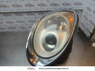 O193897 Gebruikte koplamp links Alfa Romeo Mito