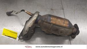 O193929 Gebruikte uitlaatspruitstuk + katalysator Citroen C1