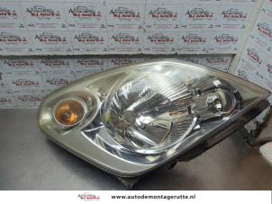 O193957 Gebruikte rechter koplamp Suzuki Splash
