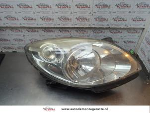 O194028 Gebruikte rechter koplamp Renault Twingo