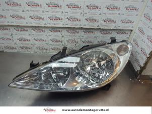 O194053 Gebruikte linker koplamp Peugeot 307