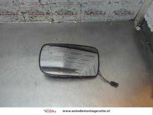O194161 Gebruikte spiegelglas links Toyota Yaris