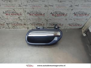 O194168 Gebruikte portiergreep 4deurs links-achter Volvo V40