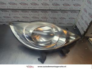 O194274 Gebruikte rechter koplamp Peugeot 107