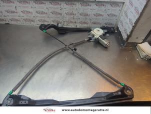 O194322 Gebruikte ruitmechaniek 2deurs links-voor Ford Focus