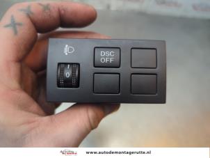 O194588 Gebruikte schakelaar koplamp ihv Mazda 2.