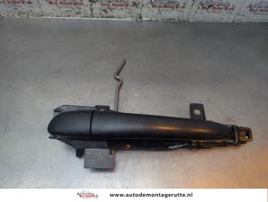 O194612 Gebruikte deurgreep 4deurs links-achter Mazda 2.