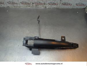 O194654 Gebruikte deurgreep 4deurs links-voor Mazda 2.