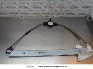 O194657 Gebruikte raammechaniek 4deurs links-voor Mazda 2.