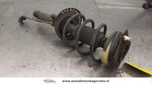 O194722 Gebruikte schokdemperpoot links-voor Renault Megane
