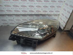 O194886 Gebruikte koplamp links Renault Scenic