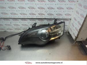 O194909 Gebruikte koplamp links Subaru Outback