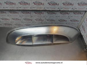 O195025 Gebruikte achterlicht links Opel Corsa
