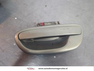 O195041 Gebruikte portiergreep 4deurs links-achter Subaru Outback