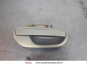 O195043 Gebruikte deurgreep 4deurs rechts-voor Subaru Outback