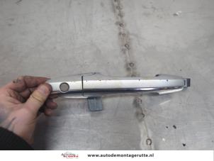 O195108 Gebruikte deurgreep 4deurs links-voor Honda Civic