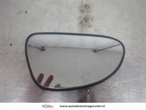 O195111 Gebruikte spiegelglas links Suzuki Alto