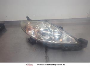 O195177 Gebruikte rechter koplamp Mazda 5.