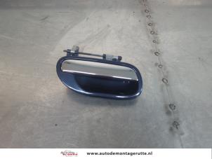 O195444 Gebruikte portiergreep 4deurs rechts-achter Volvo S40