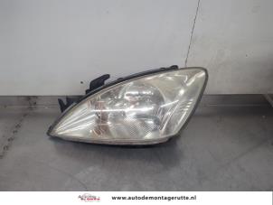 O195446 Gebruikte linker koplamp Mitsubishi Lancer