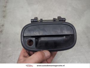 O195680 Gebruikte deurgreep 4deurs rechts-voor Suzuki Alto