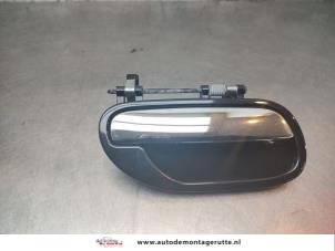 O195819 Gebruikte portiergreep 4deurs rechts-voor Volvo V40