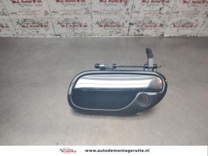 O195820 Gebruikte portiergreep 4deurs links-voor Volvo V40