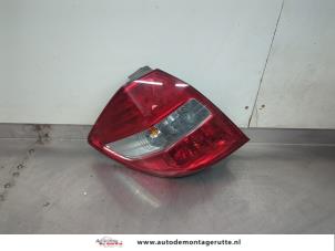 O195870 Gebruikte achterlicht links Honda Jazz