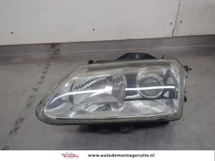 O195883 Gebruikte koplamp links Renault Espace